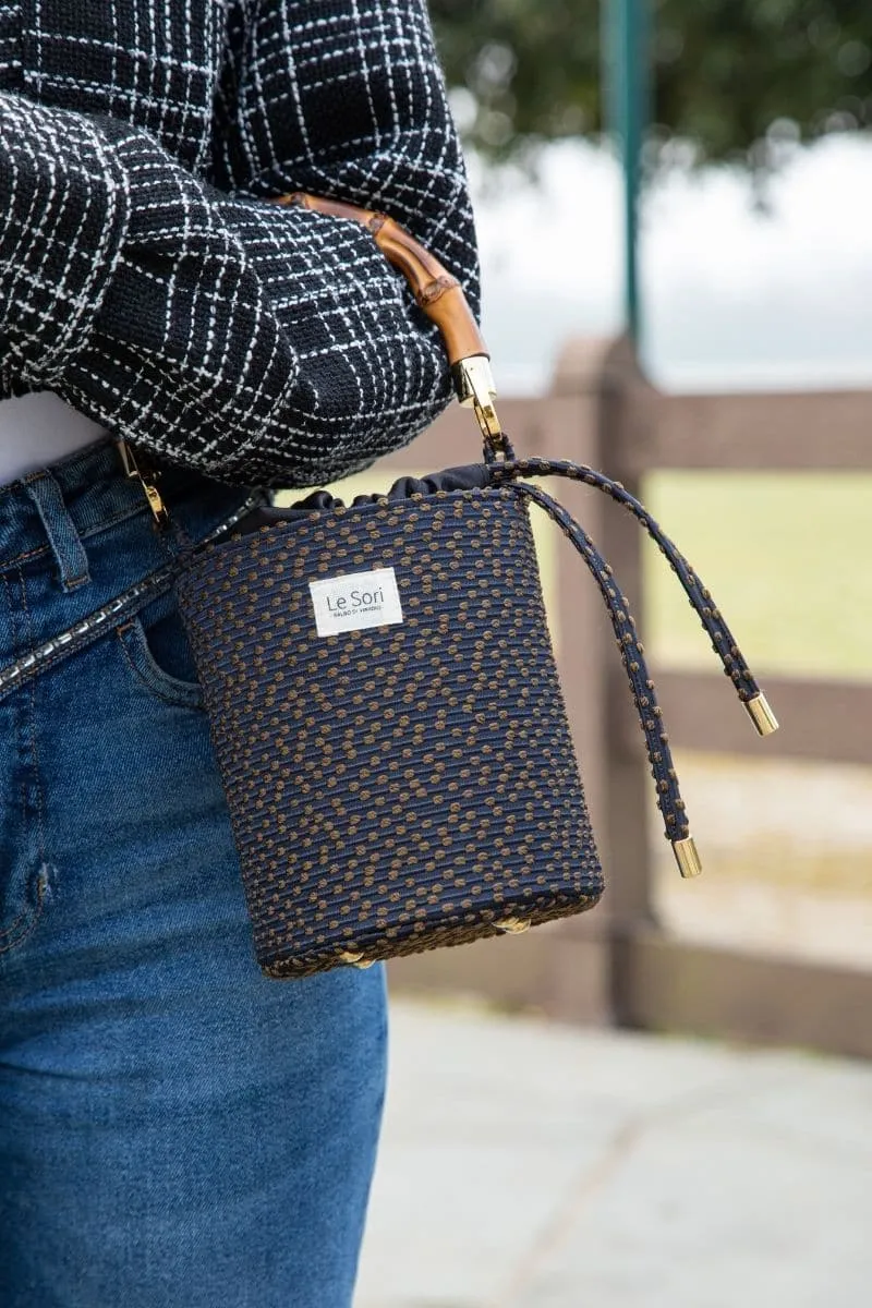 BLACK ERA LEATHER AND FABRIC BUCKET BAG