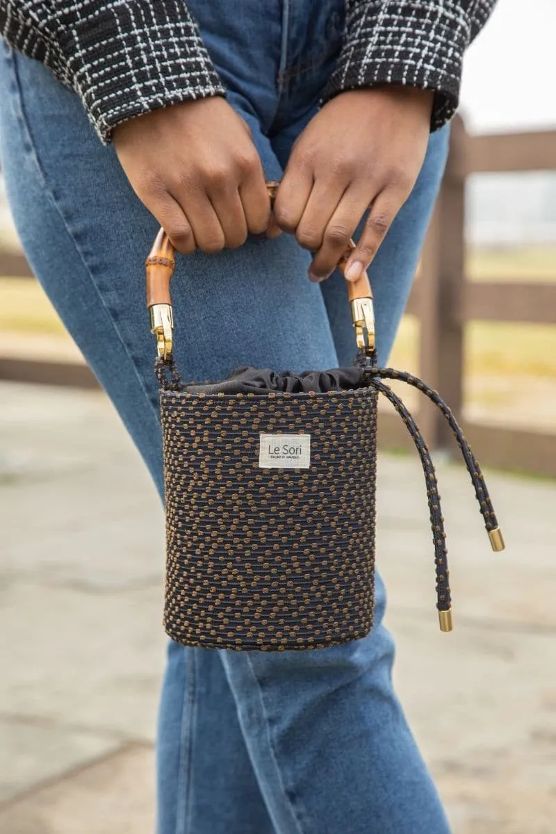 BLACK ERA LEATHER AND FABRIC BUCKET BAG